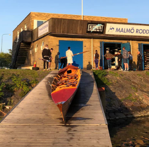 Malmö Roddklubb inrigger on dock